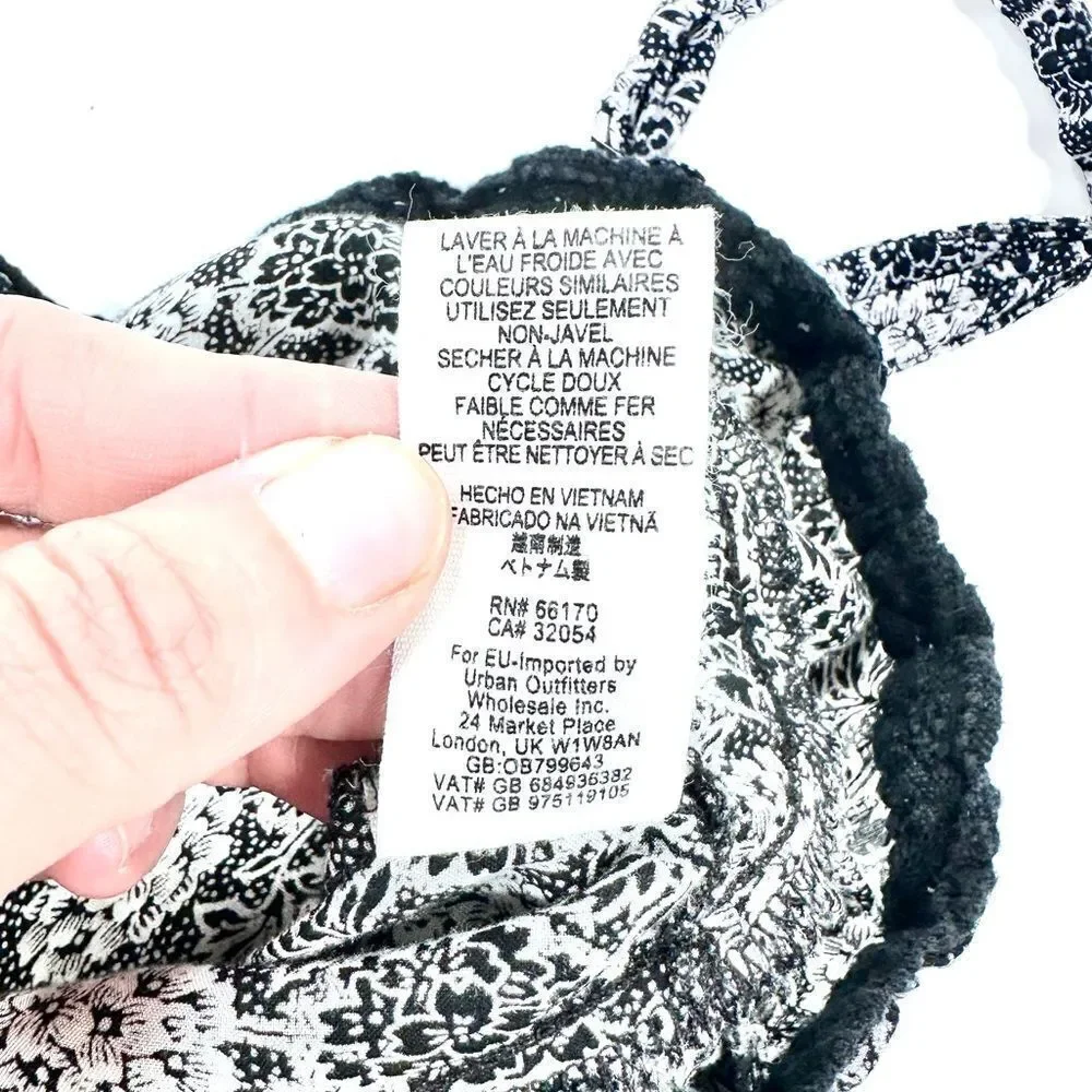 Free people black and white floral bottom front tiered tank top S